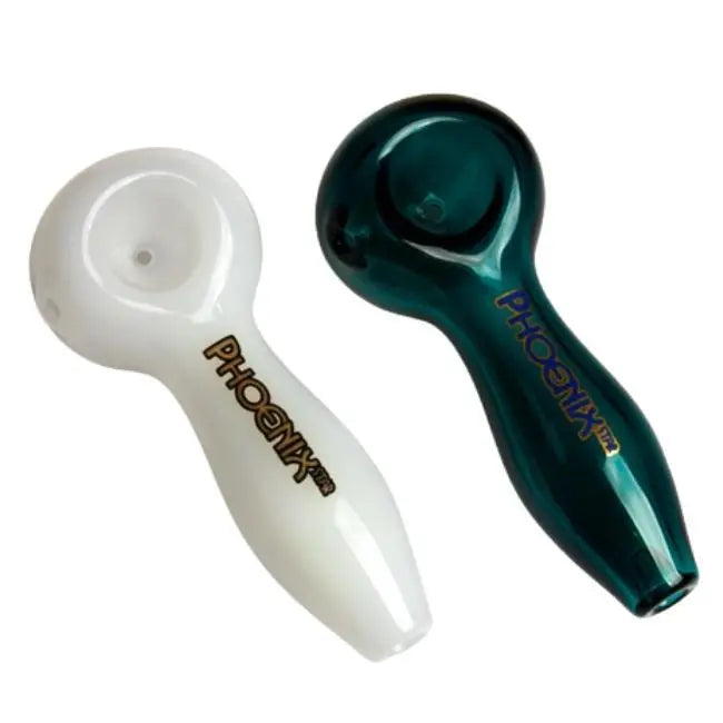 Two smoking pipes, one white and one teal, with 'Phoenix' branding on a white background.